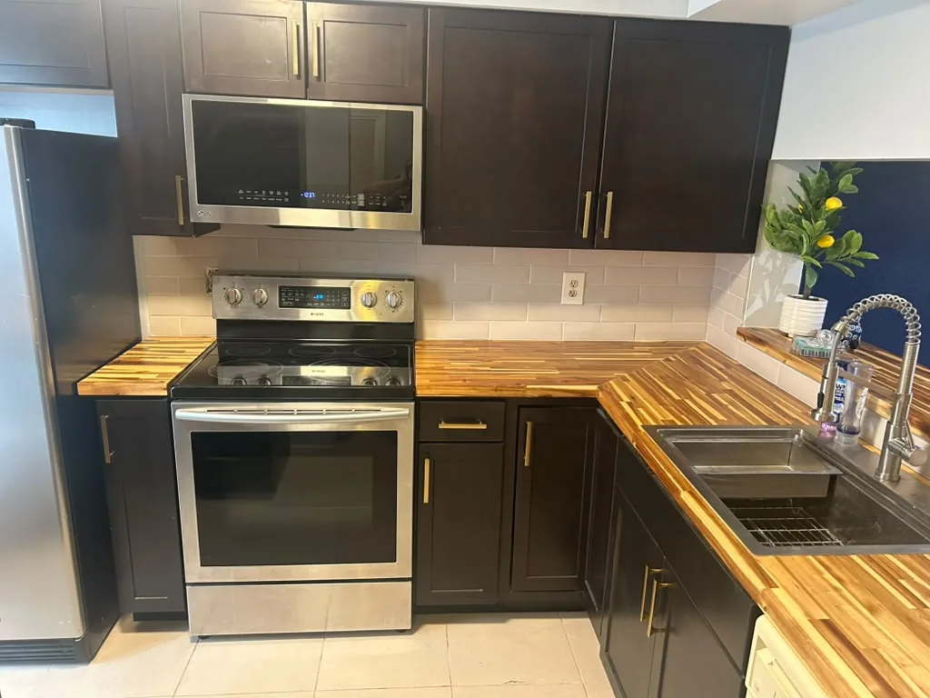 The remodeled kitchen William built, cleaned by Fallon and her team